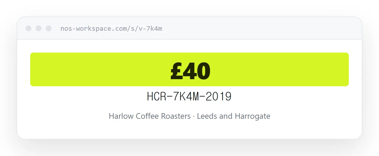 The voucher held up at a counter. The code is large and the value is unmistakable.