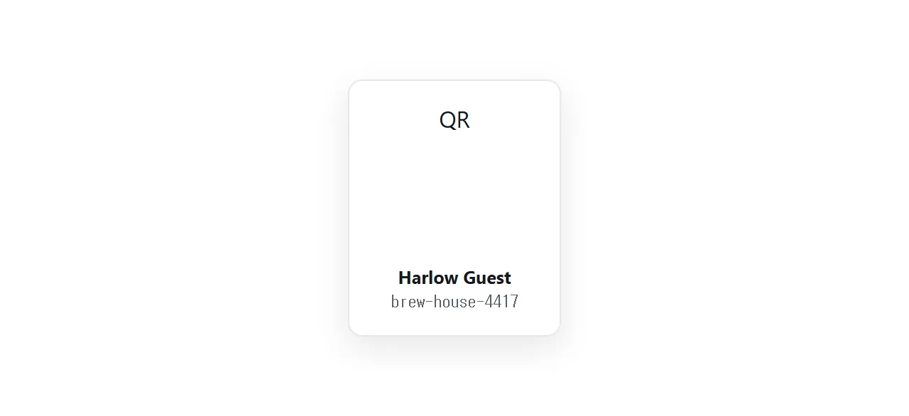 A small printed card on a table with a QR code and the network name beneath.